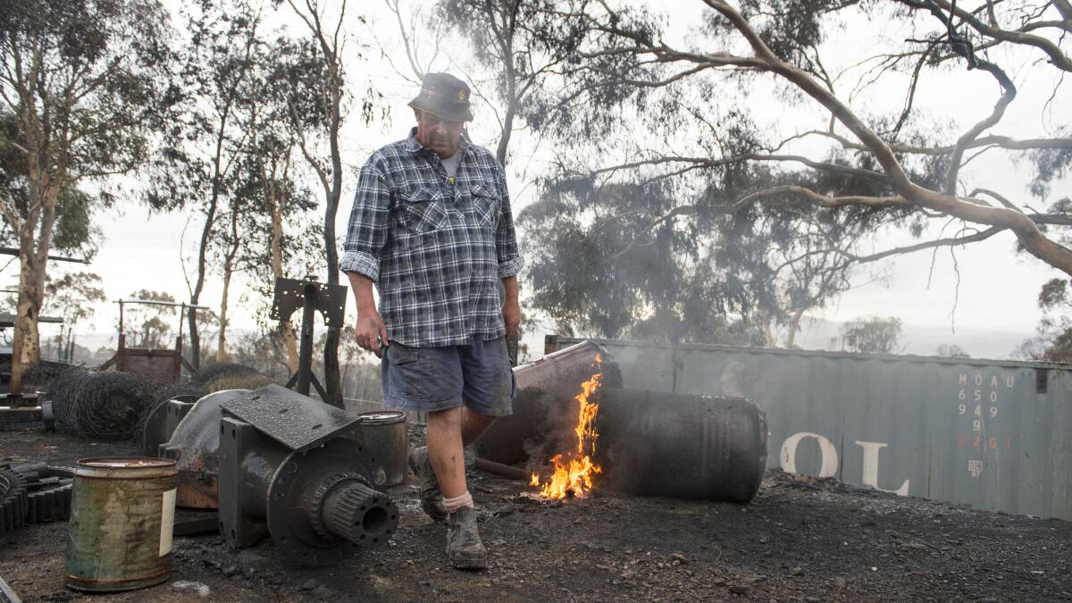 Kevin Lindley inspects his property. Picture: Jay Cronan