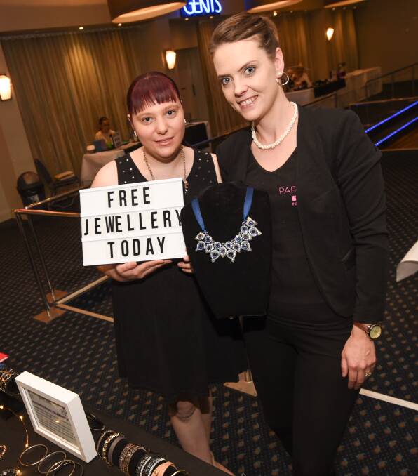 PROMOTION: Sarah Knight and Lisa Handley promoted the latest in fine jewelry on the day.  140816GGB01