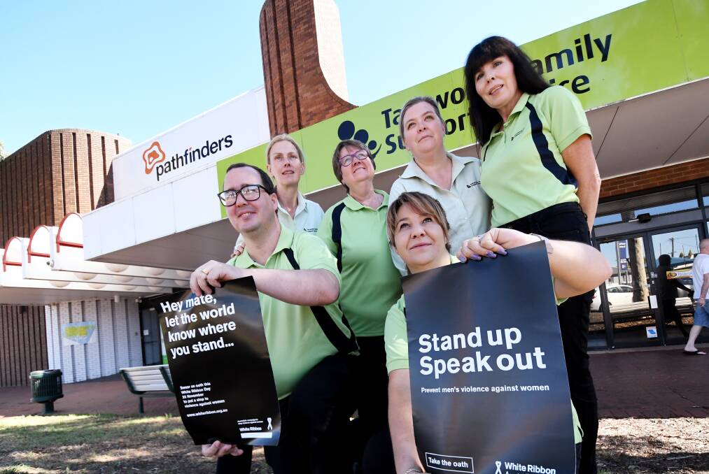 SPEAK OUT: The staff from Tamworth Family Support Service want you to raise awareness of domestic violence this weekend. Photo: Gareth Gardner
