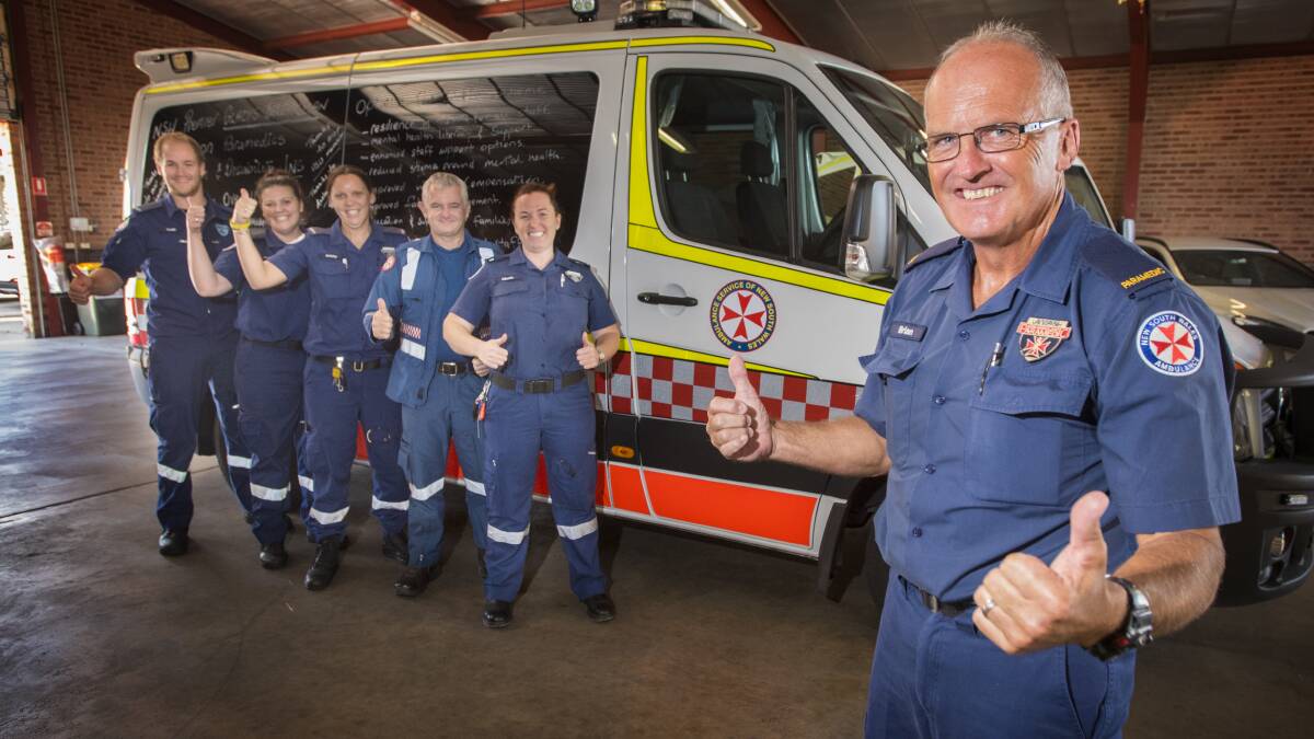 WIN FOR AMBOS: Paramedics Todd Wheeler, Jessica Townsend, Kristy Androutos, James Thompson, Nicole Beacroft and Brian Bridges celebrate the Premier's decision. Photo: Peter Hardin 220217PHC23