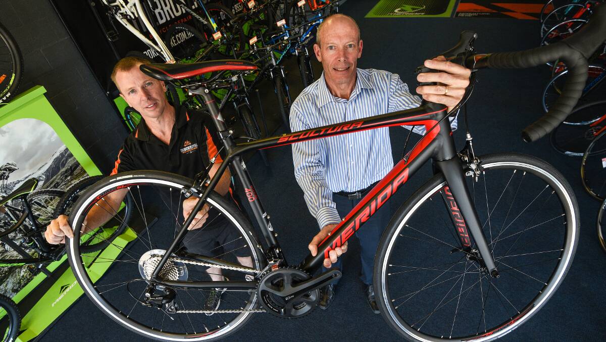 NEW WHEELS: Terry Robinson invites you to purchase a raffle ticket for this new Merida Road Bike at Pedal The Peel. Photo:Gareth Gardner 090217GGD04