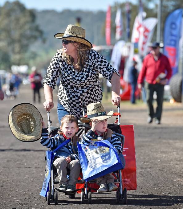 FAMILY OUTING: Hudson 4, William 5 and Kate Meyer strolled around the AgQuip grounds. 160816GGD20