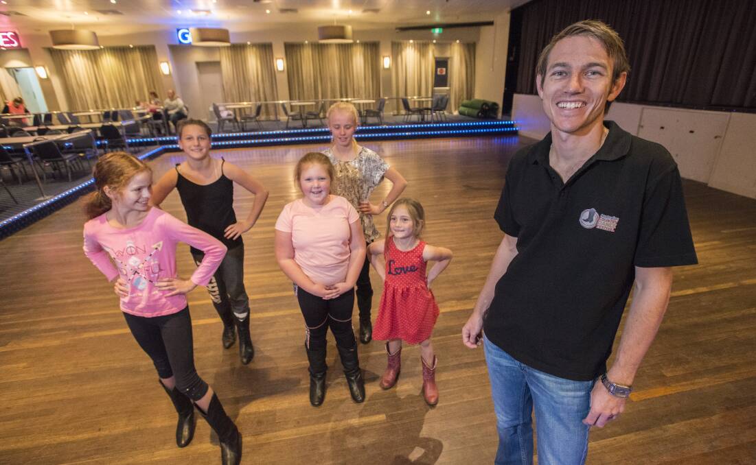 SHOW TIME: Mayworth organiser Chris Watson with young rising line dancing stars ahead of the big event. Photo: Peter Hardin 270417PHC33