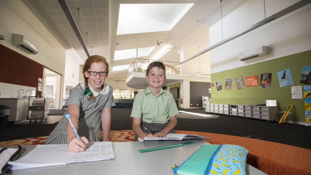 BRIGHT FUTURE: St Nicholas Primary School students Harriet Wilde and Ethan Wheeler in the new learning hub. Photo: Peter Hardin 210217PHC19