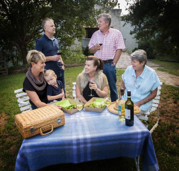LOCAL PRODUCE: Phebe Whale, Eddie Whale, Raegan Sutherland, Marlies Elbourne, Nick Bradford and Paul Elbourne prepare for the picnic which will showcase local produce. Photo:Peter Hardin 070317PHA16