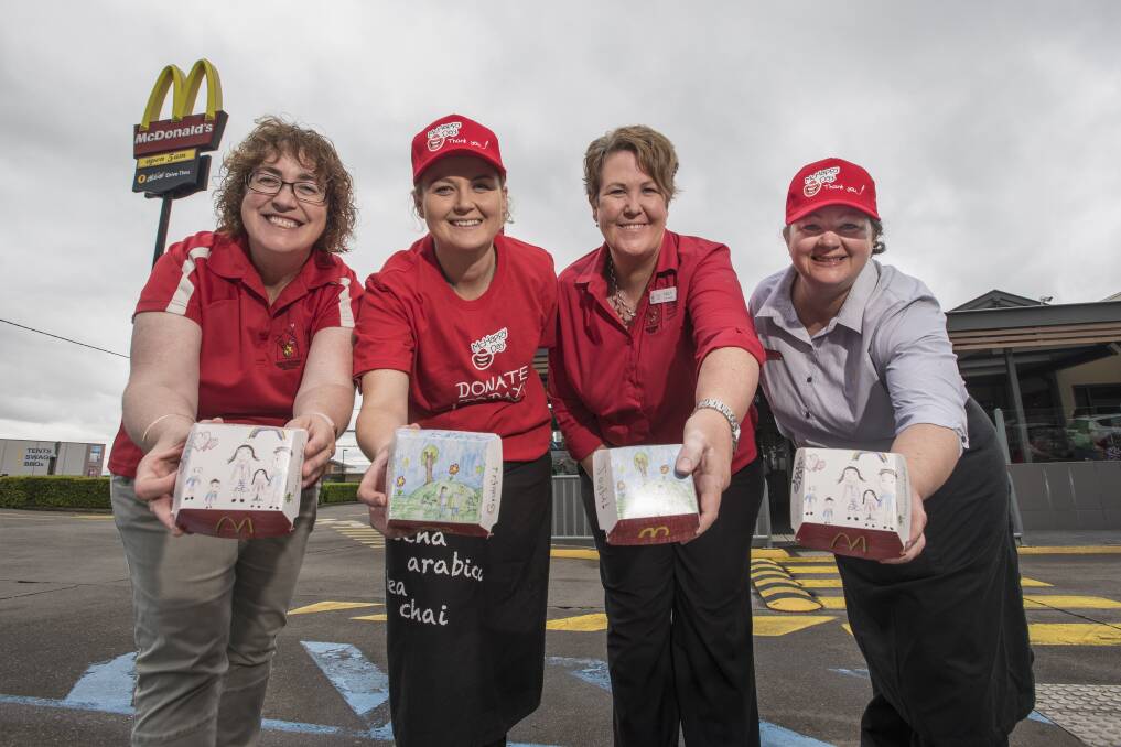 SUPPORT THE CAUSE: Debbie Herdegen, Emily Crompton, Kelly McCrohon and Erica Haak invite you to support McHappy Day this weekend. Photo: Peter Hardin 121017PHB008
