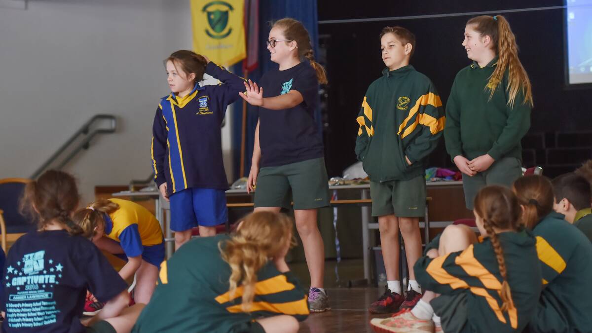 LINING UP: Students from St Mary's at Armidale and St Nicholas' school in Tamworth were involved in the day. 180816GGB01