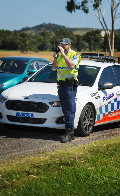 ON ALERT: Oxley highway patrol Senior Constable Anthony Simshauser and his colleagues nabbed hundreds of speeding drivers. Photo: Peter Hardin 030117PHA18
