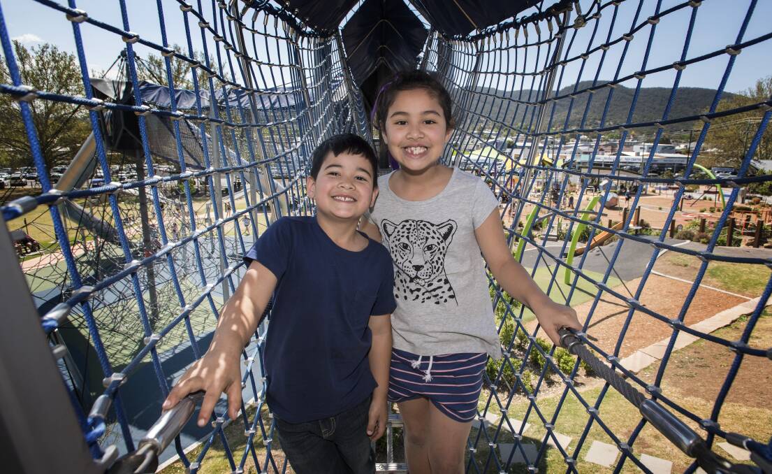 HOLIDAY FUN: Ruben and Lilly Htwe from Wilberforce check out the Tamworth Adventure Playground as part of their school holiday activities. Photo: Peter Hardin 