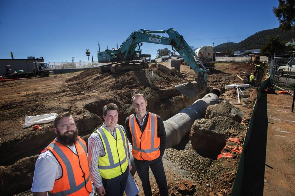 UNDERWAY: Will Campbell of Family Pharmacy, Stephen McDonald of Formline Group and developer Derek Miller at the site. Photo: Peter Hardin 