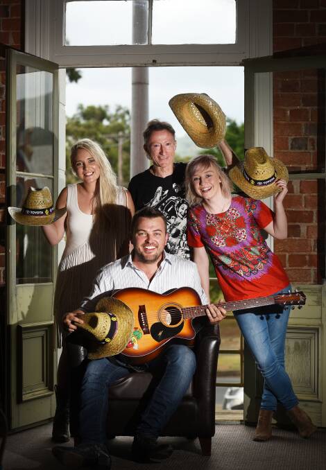 OUR FUTURE: Rising country stars Aleyce Simmonds, Travis Collins and Ashleigh Dallas with country legend Lawrie Minson. Photo:Gareth Gardner.