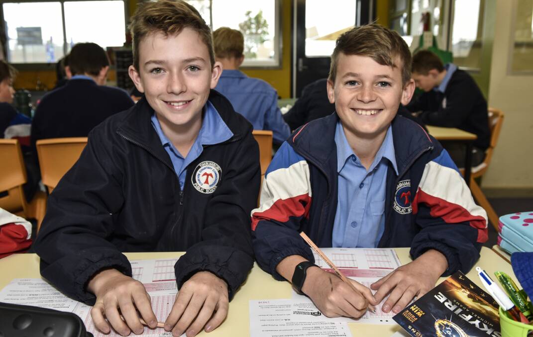 PENS DOWN: Sam Murphy and Rory Littlejohns were part of 19,000 students to participate across NSW. 240816PHA07