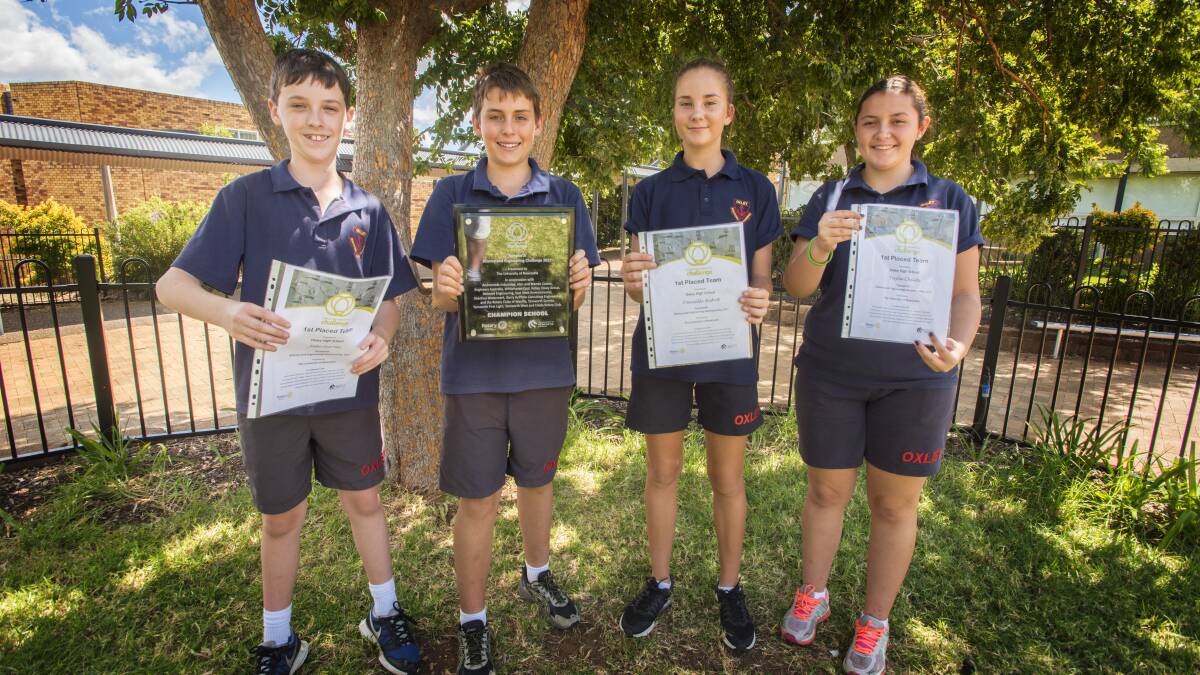 WINNERS ARE GRINNERS: Oxley High students Jake Gurney, Benji Stacey, Danielle Bishop and Tayla Childs with their awards. Photo: Peter Hardin 160317PHC12