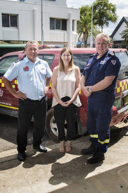 BIG EVENT:  Superintendent Tom Cooper, Gretel Vincent and Brad Harrison wait for the arrival of more than 35 Fire and Rescue NSW bosses. Photo: Peter Hardin 190218PHDC019
