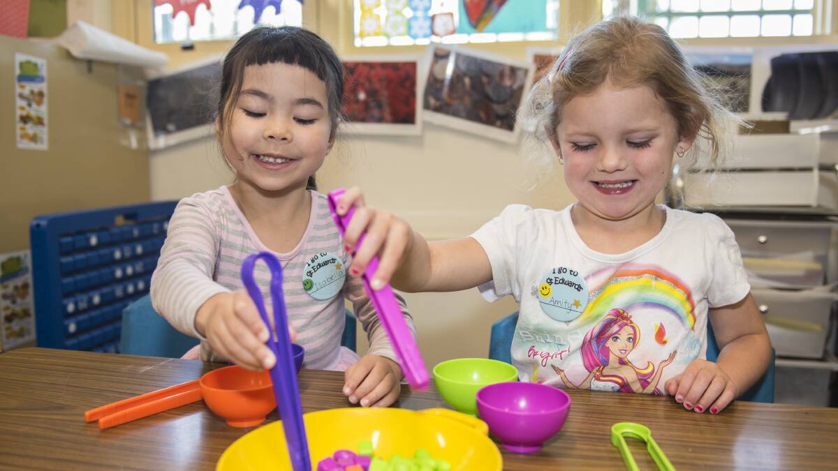 PRETEND COOKING: Isabella Hoskins and Amity Wall cook up a storm at kindy. 141016PHB13