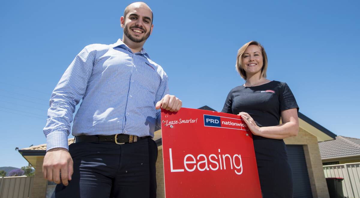 IN DEMAND: Agent Mark Sleiman and business development manager Sarah Mayo say there's an oversupply of rental homes. Photo:Peter Hardin 