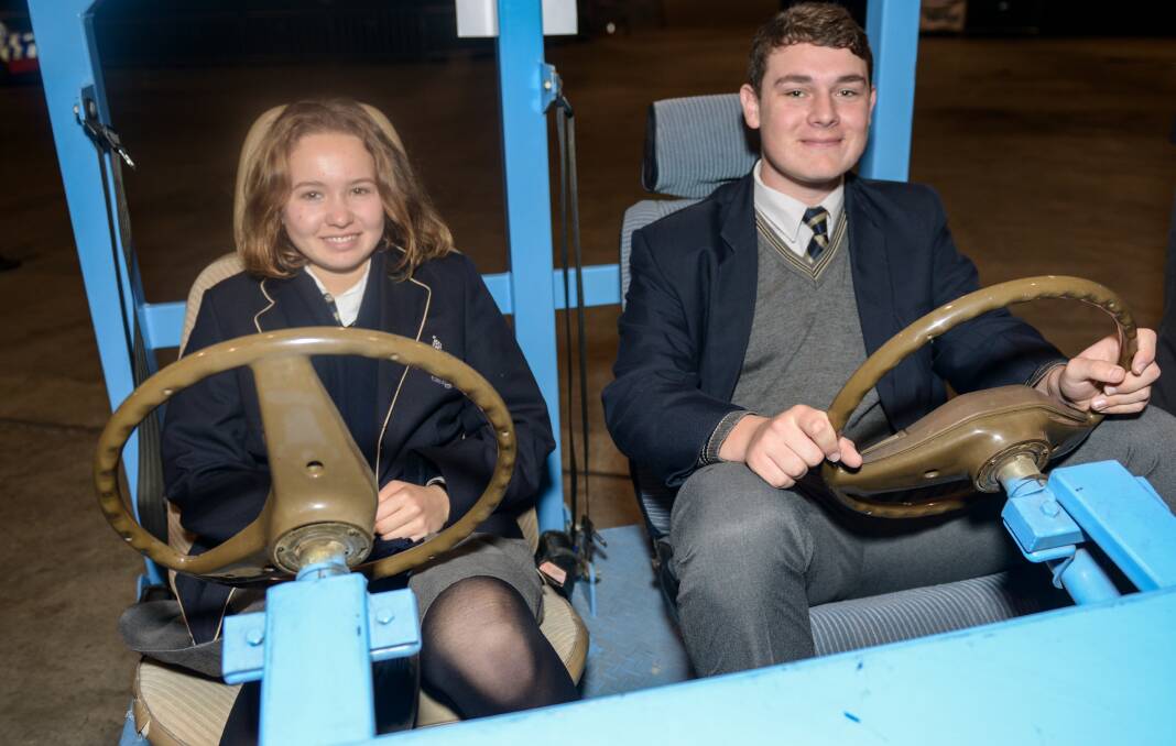 YOUNG DRIVERS: Dominique Halley and Will Almond got behind the steering wheel in one of the activities at the expo. 230816PHA54