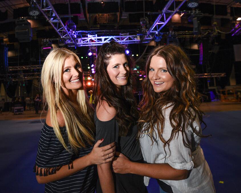 THEY'RE BACK: The McClymonts, Sam, Mollie and Brooke, will perform in Tamworth on Wednesday night. Photo: Gareth Gardner 