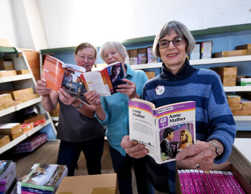 BOOKS GALORE: Mary Allen, Doreen Eunson and Joy McInnes invite you to check out the Lions' Book Sale this weekend. Photo: Gareth Gardner 091117GGB02
