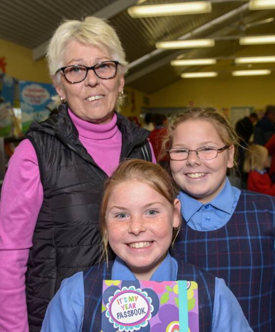 BOOK FAIR  Kerrie Butler, Jayde Butler and Taleeyah Butler enjoyed the morning at the school book fair. 220816PHA12