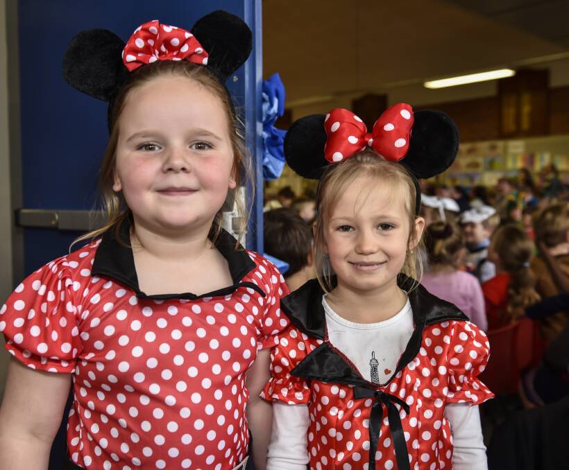 DISNEY ADVENTURES: Taylor Betts and Addisyn Brooks wore matching Minnie Mouse costumes for Book Week. 240816PHB38