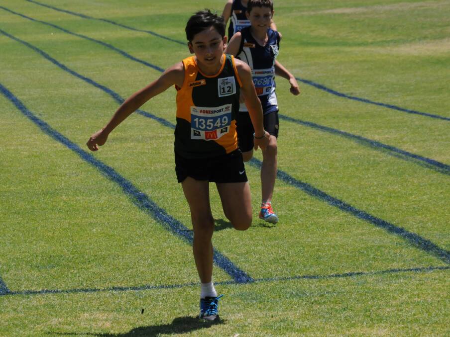 HOT STUFF: Armidale's Andre Cooper reaches the finish line in a 100m sprint in the under 12 boys age group during the New England Zone Championships.