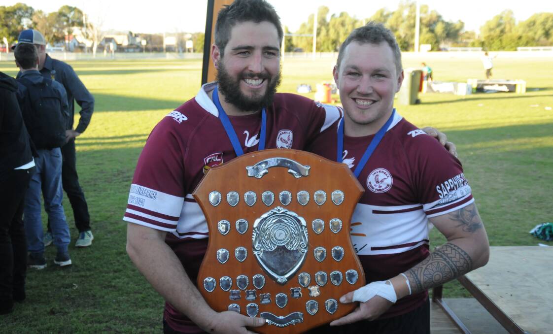 WE DID IT: Inverell RSM Hawks skipper Alex McCosker and grand final player-of-the-match award winner Guy Mepham savour another premiership.
