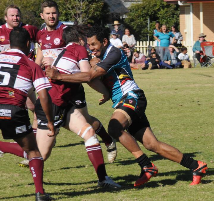 ON THE CHARGE: MacIntyre Warriors second-rower Harold Brown surges into the Inverell Hawks defence during the Group 19 decider last Sunday. The Warriors were beaten but unbowed as they had a fine debut season.