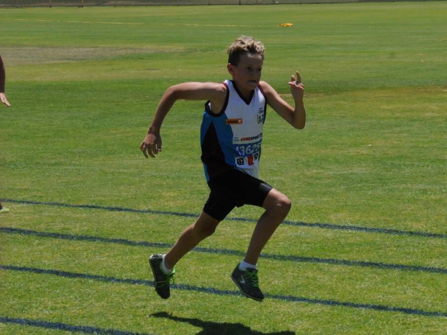 FIERCE DETERMINATION: Lochie Solomon of Inverell gives his all in a boys under 12 race at Wolseley Park in Gunnedah on Saturday.