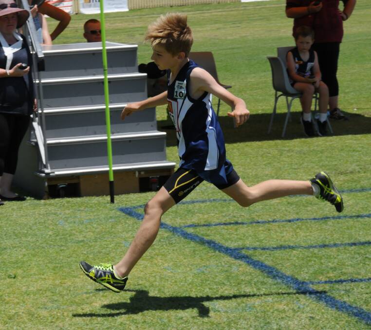 FINISH LINE: Tamworth's Jackson Moore comes first in an under 10 boys 100m sprint during the athletics carnival at Gunnedah on the weekend.