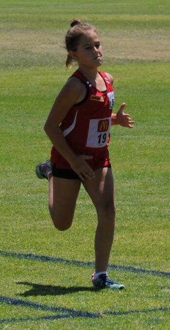 HARD WORKER: Manilla's Sekora Daley earned first place in an under 8 girls 100m race at Gunnedah on day one of the New England Zone Championships.