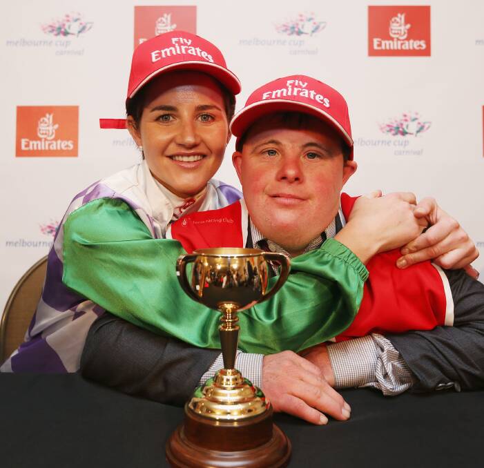 Winning Jockey Michelle Payne with her brother and Prince of Penzance's strapper, Stevie Payne.