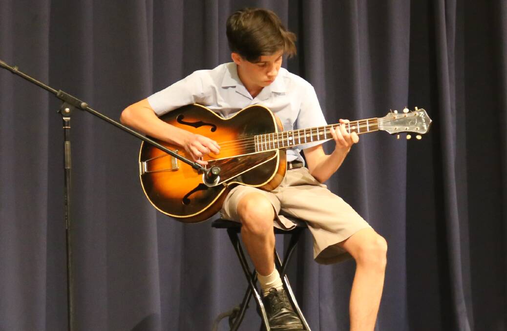 Year 7 student, Myles Davis, wowed the crowd at Calrossy’s Boys music night with his guitar skills.