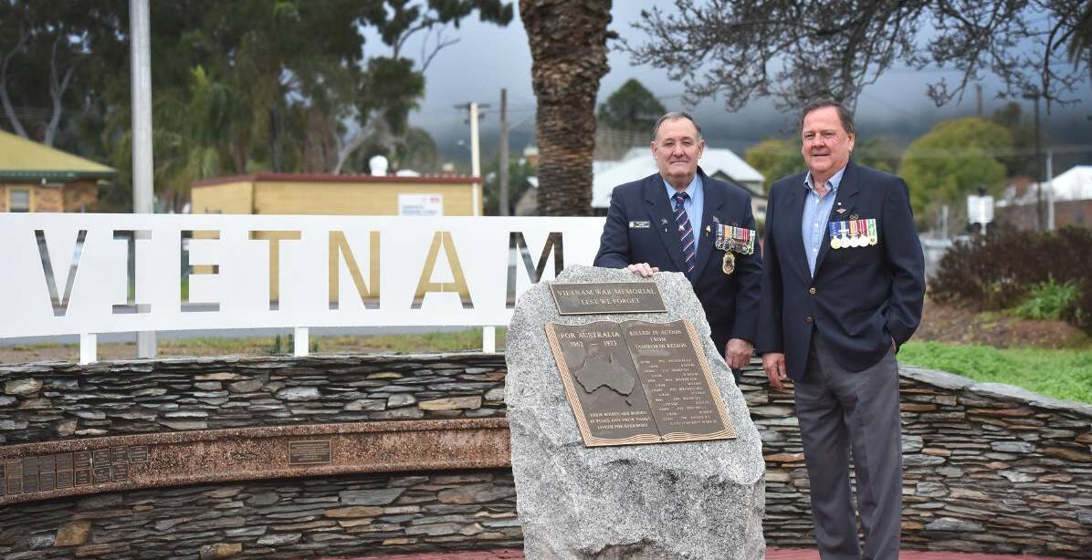 Tamworth RSL Sub-branch president Bob Chapman and North West Vietnam Veterans Social Group president Wally Franklin, pictured at the memorial.