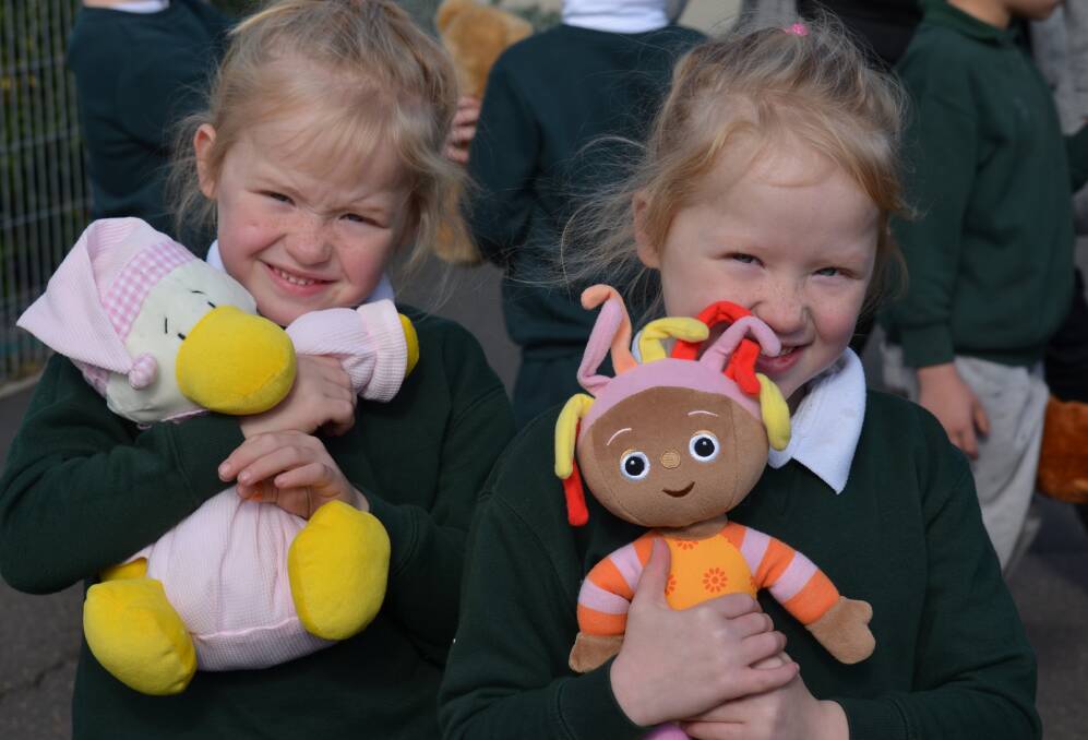 Cuddly friends: Hope and Georgie-Rae Taylor enjoying the Teddy Bear activities during a ‘beary’ exciting but exhausting week.