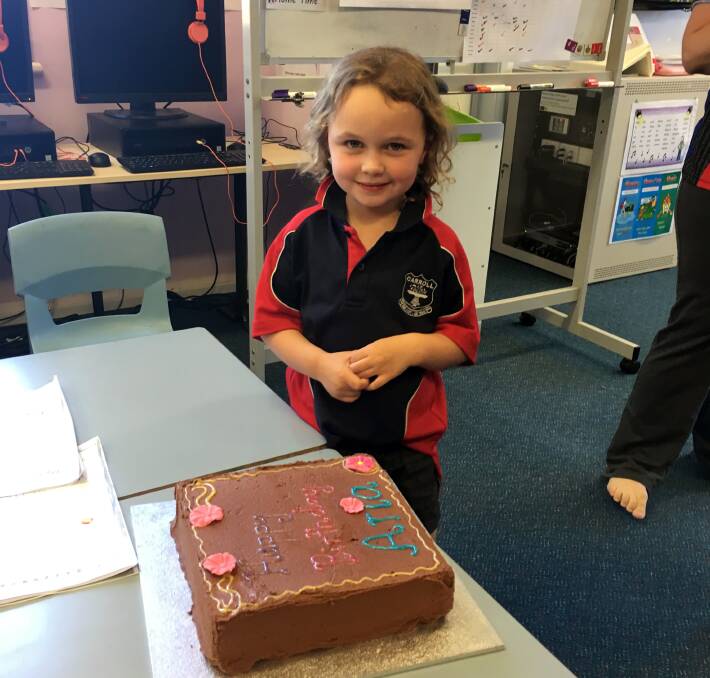 Aria Brown celebrates her birthday with a delicious cake.
 