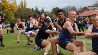  Abbott House boys pull their hardest in the tug-o-war at the TAS athletics carnival.