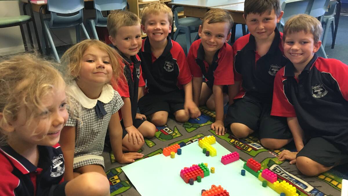 Carroll Infants Creating 3d Classroom Map with blocks.