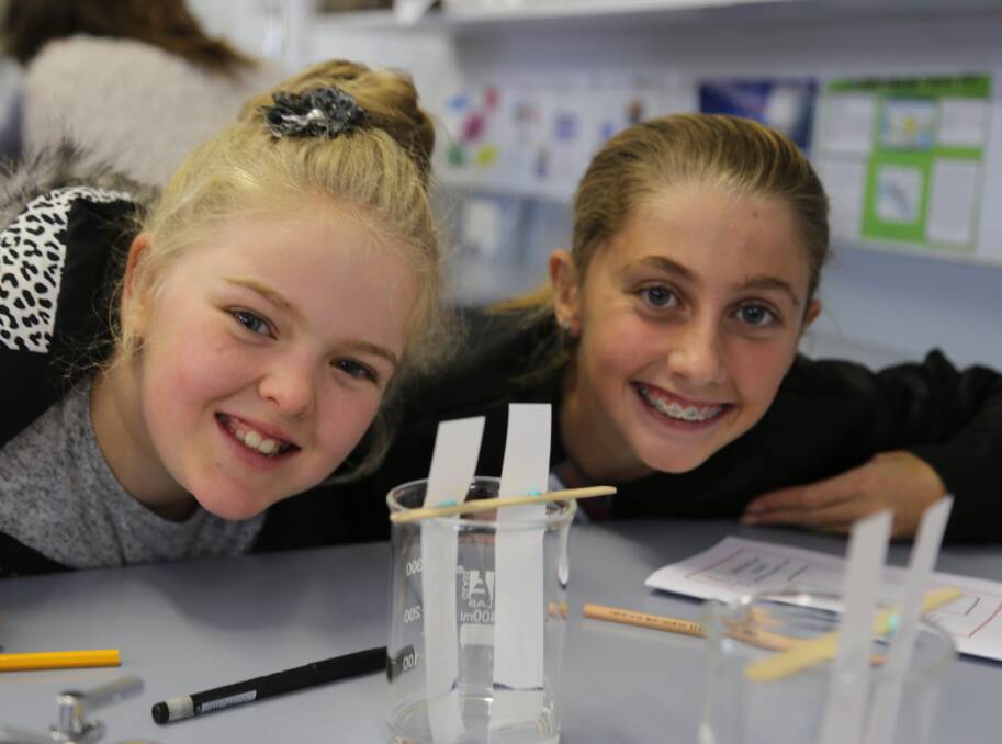 Calrossy's Leila Ryan, left, and Alex Hayes, get up close to some chromatography as they enjoy a special science workshop at Calrossy’s Experience Day.