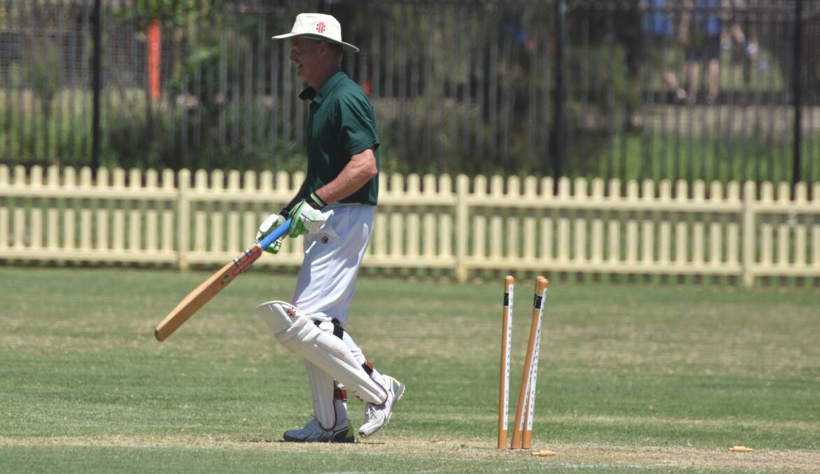 He's got him: Craig Stoddart is clean bowled and makes his way from the pitch at Oxley Oval. Photo: Matt Attard