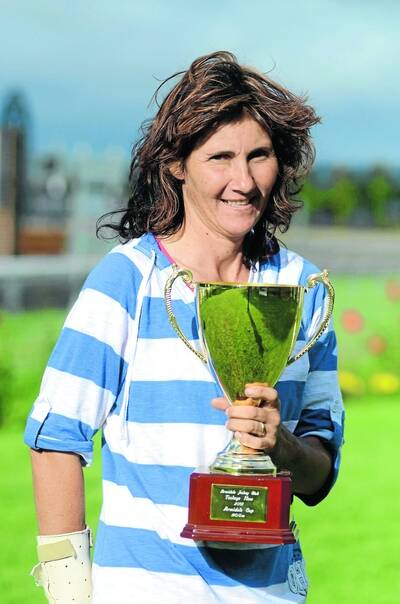 Owner/trainer Bindi Cheers with the Armidale Cup.