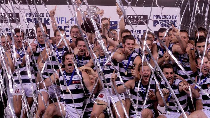 The Cats celebrate their win over Port Melbourne.