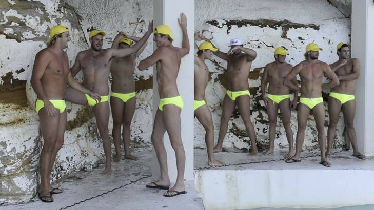 The Australian Olympic Water Polo team stretch prior to an exhibition match in Bondi.