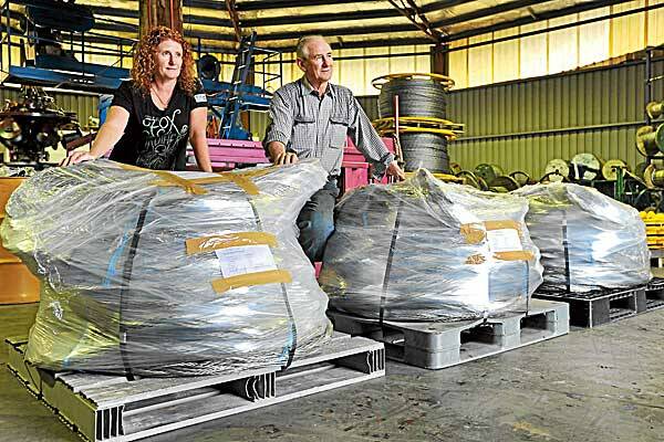 OUTWARD-BOUND: Andromeda administration manager Annette Williams and general manager Raymond McLaren are ready to send the superflex recovery strops all the way to Mongolia. Photos: Barry Smith 230412BSC02