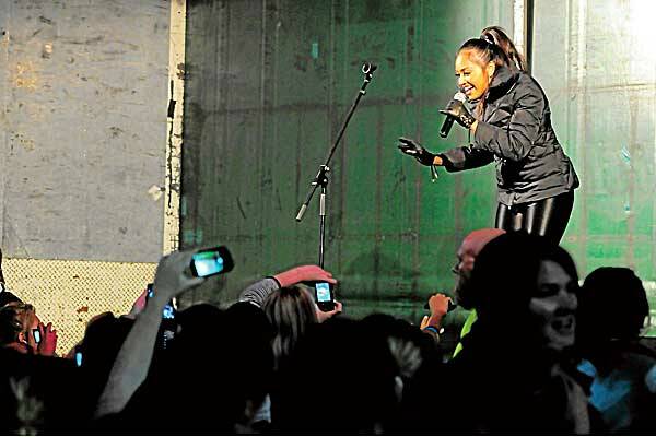 Headline act: Jessica Mauboy plays to her fans at the Bunnings opening last night. Photo: Robert Chappel 110512RCD13