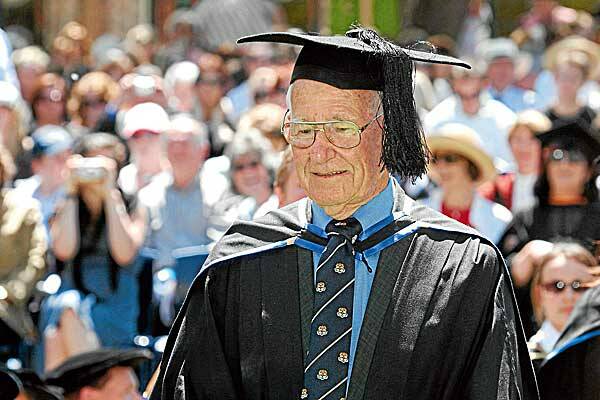Never too old: Allan Stewart, 97, collects his degree from Southern Cross University. Photo: Fairfax