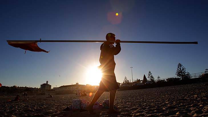 Balancing act: Waverley Council lifeguards at Bondi Beach do a ''tough'' job and women are welcome to join, said a spokeswoman. Photo: Dallas Kilponen