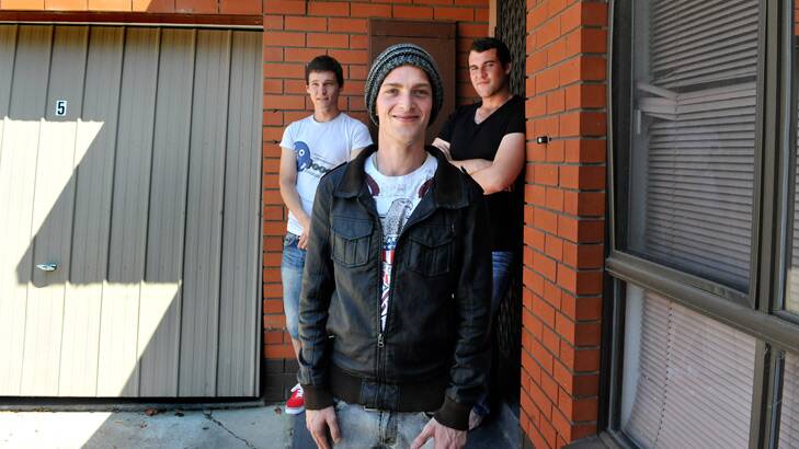 Jamie Young (middle) created the Twitter account (@HomelessInMelb) which has helped homeless people, including Ben Stevens and Joe Brown (right), to find a house  and share stories about life on the streets.