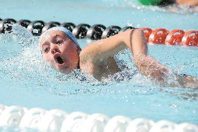 From school to pool: Tamworth South’s Abbey Cook was just one of about 600 young swimmers competing at the Tamworth Zone PSSA Swimming Carnival yesterday. South dominated the girls’ events on a day where five records were set in the pool. See page 90 for story and more photos: Photo: Rob Chappel