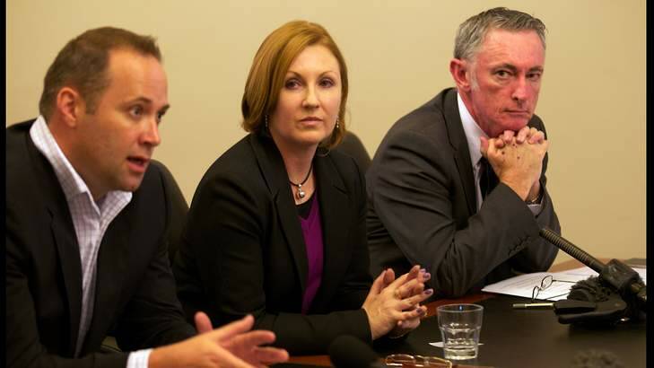 Fighting for freedom to report: Journalists Steve Pennell (L) and, Adele Ferguson with Paul Murphy from the Media Entertainment and Arts Alliance, at press conference to discuss shield laws for journalists. Photo: Simon O'Dwyer